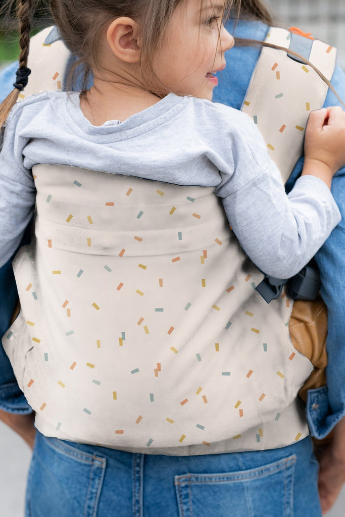 Beco Toddler Carrier in Sprinkles pattern - shown from the back with toddler in the back carry position